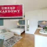 Urzad Skarbowy kontroluje wspólnotę mieszkaniową. Wnętrze mieszkania z sypialnią i aneksem kuchennym.